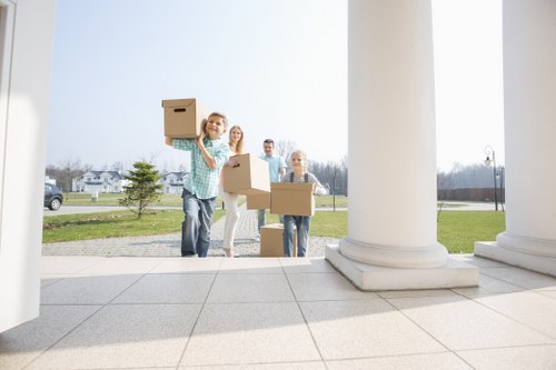 Commercial relocation team organising equipment and boxes