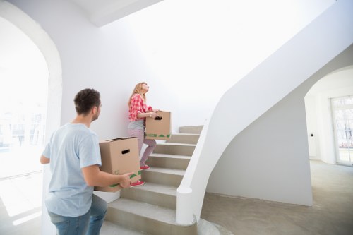 Loading furniture into a van for a Croydon moving job